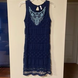 Mini navy blue, sleeveless, dress.